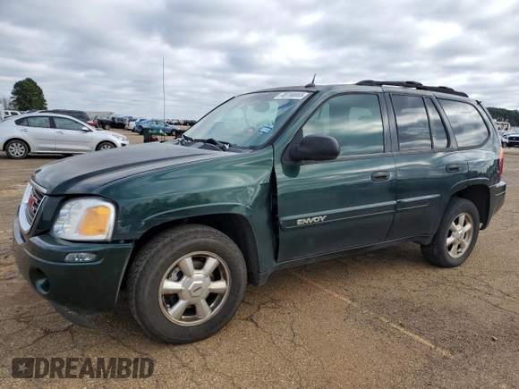 2004 GMC Envoy SLE with VIN 1GKDS13SX42234675, listed as a Copart auction lot 48780955 with 217,790 mi miles and Salvage Title. Bid and sale history available at carsss.com. Image 1.