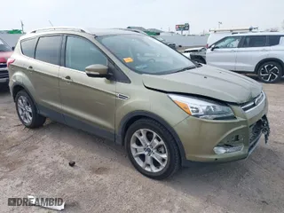 2014 Ford Escape Titanium with VIN 1FMCU9J9XEUB30625, listed as a IAAI auction lot 41581279 with 142,378 mi miles. Bid and sale history available at carsss.com. Image 1.