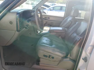 2006 GMC Yukon Denali z VIN 1GKEK63UX6J136371, wystawiony jako Copart lot #50168595 z przebiegiem Nie podano mil oraz Szkody całkowita. Historia ofert i sprzedaży dostępna na DreamBid. Obrazek 7.