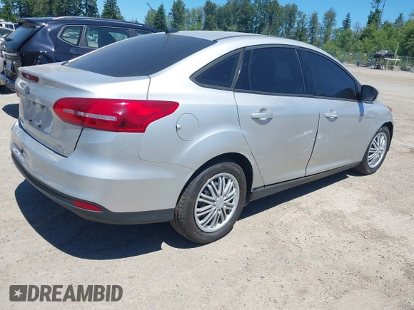 2016 Ford Focus SE with VIN 1FADP3F24GL286330, listed as a IAAI auction lot 42433516 with 130,814 mi miles and . Bid and sale history available at DreamBid. Image 4.