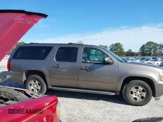 2011 Chevrolet Suburban LT with VIN 1GNSCJE00BR122636, listed as a IAAI auction lot 41594772 with 202,433 mi miles. Bid and sale history available at carsss.com. Image 12.