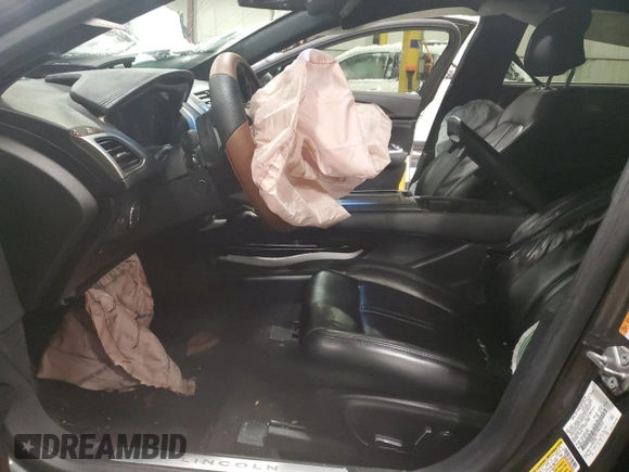 2017 Lincoln MKZ Select с VIN 3LN6L5DC1HR614453, выставлен на аукционе Copart как лот 85330524 с пробегом Не указан миль и Списание • Salvage title. История ставок и продаж доступна на DreamBid. Изображение 7.