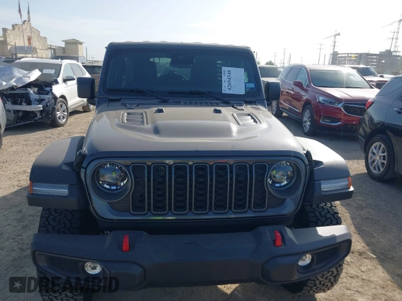 2025 Jeep Wrangler Rubicon with VIN 1C4PJXFNXSW532895, listed as a IAAI auction lot 42694548 with 1,886 mi miles and . Bid and sale history available at DreamBid. Image 6.