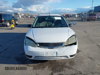 2007 Ford Focus S with VIN 1FAHP34N67W244433, listed as a IAAI auction lot 41539078 with 107,318 mi miles and . Bid and sale history available at DreamBid. Image 12.
