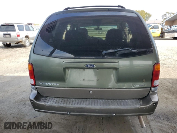 2002 Ford Windstar LTD z VIN 2FMDA58482BB68372, wystawiony jako Copart lot #43251315 z przebiegiem 179 327 mil mil oraz Czysty tytuł • Clean title. Historia ofert i sprzedaży dostępna na DreamBid. Obrazek 6.