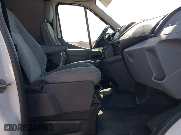 2015 Ford Transit z VIN 1FTNE1CM8FKB16085, wystawiony jako IAAI lot #42438768 z przebiegiem Nie podano mil oraz . Historia ofert i sprzedaży dostępna na DreamBid. Obrazek 5.