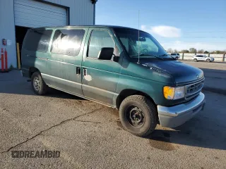 1999 Ford Econoline Passenger XL with VIN 1FMRE1126XHB41841, listed as a Copart auction lot 51338135 with 161,416 mi miles and Clean title. Bid and sale history available at DreamBid. Image 4.