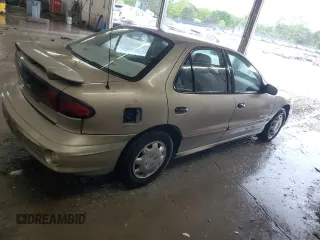 2002 Pontiac Sunfire SE z VIN 1G2JB524627155677, wystawiony jako Copart lot #55771625 z przebiegiem 169 305 mil mil oraz Szkoda całkowita • Salvage title. Historia ofert i sprzedaży dostępna na DreamBid. Obrazek 3.