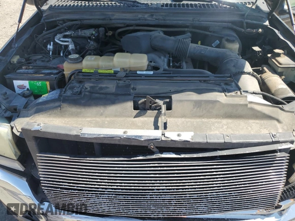 2002 Ford Excursion Limited z VIN 1FMNU43S92EC53835, wystawiony jako Copart lot #60525215 z przebiegiem 207 011 mil mil oraz Szkoda całkowita • Salvage title. Historia ofert i sprzedaży dostępna na DreamBid. Obrazek 11.