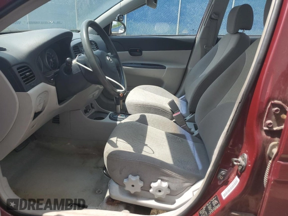 2006 Hyundai Accent GL z VIN KMHCN45C26U052459, wystawiony jako Copart lot #60089355 z przebiegiem 247 311 mil mil oraz Szkoda całkowita • Salvage title. Historia ofert i sprzedaży dostępna na DreamBid. Obrazek 7.