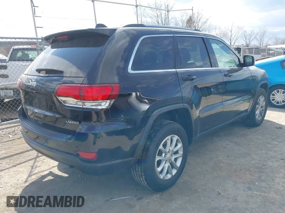 2021 Jeep Grand Cherokee Laredo X with VIN 1C4RJFAG7MC502866, listed as a IAAI auction lot 41841328 with 59,870 mi miles and . Bid and sale history available at DreamBid. Image 4.