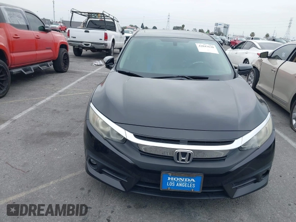 2016 Honda Civic Sedan EX-T with VIN 2HGFC1F34GH645220, listed as a IAAI auction lot 42043630 with 55,301 mi miles. Bid and sale history available at carsss.com. Image 12.