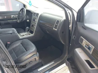 2007 Lincoln MKX with VIN 2LMDU68C77BJ11645, listed as a IAAI auction lot 42097015 with 155,678 mi miles. Bid and sale history available at carsss.com. Image 5.