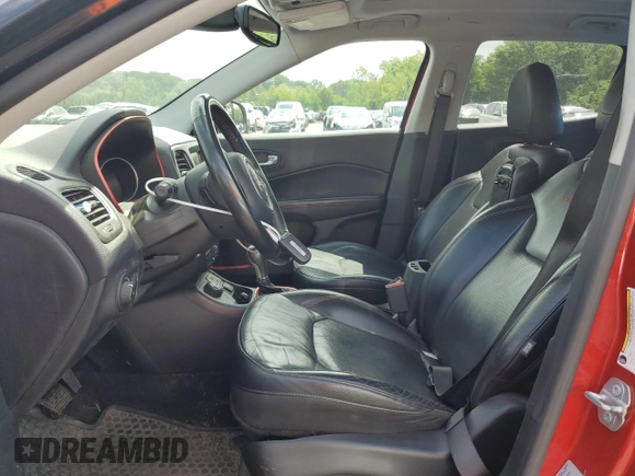 2017 Jeep Compass Trailhawk with VIN 3C4NJDDB7HT657463, listed as a Copart auction lot 60650765 with 100,979 mi miles and Salvage title. Bid and sale history available at DreamBid. Image 7.