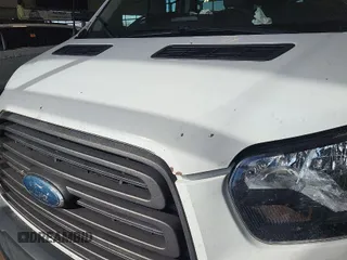 2015 Ford Transit XL with VIN 1FBZX2YM9FKA42514, listed as a IAAI auction lot 42024214 with 315,974 mi miles and . Bid and sale history available at DreamBid. Image 1.