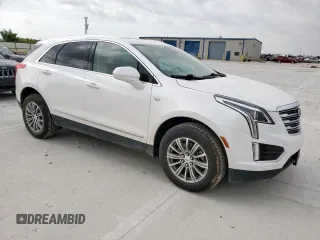 2017 Cadillac XT5 Luxury FWD with VIN 1GYKNBRS5HZ131517, listed as a Copart auction lot 60605595 with 130,522 mi miles and Clean title. Bid and sale history available at DreamBid. Image 4.