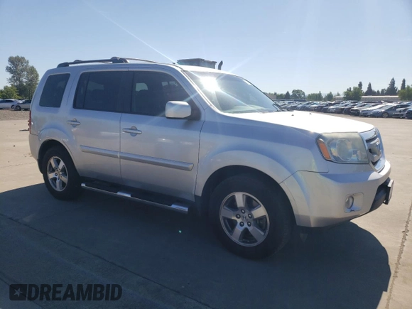 2009 Honda Pilot EX-L with VIN 5FNYF48549B009985, listed as a Copart auction lot 55786845 with 118,682 mi miles and Salvage title. Bid and sale history available at DreamBid. Image 4.