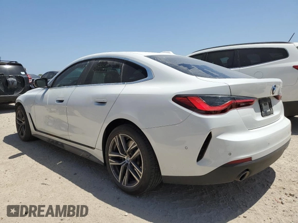2024 BMW 4 Series 430i with VIN WBA63AV09RFR61736, listed as a Copart auction lot 52798015 with 45,705 mi miles and Salvage title. Bid and sale history available at DreamBid. Image 2.