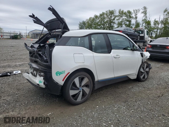 2015 BMW i3 z VIN WBY1Z4C59FV505134, wystawiony jako Copart lot #55181285 z przebiegiem Nie podano mil oraz Szkody całkowita. Historia ofert i sprzedaży dostępna na DreamBid. Obrazek 3.
