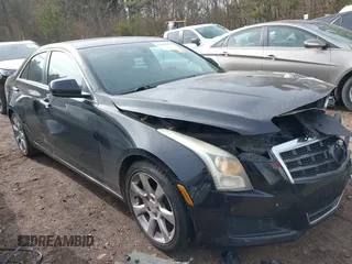 2013 Cadillac ATS z VIN 1G6AA5RX4D0141578, wystawiony jako IAAI lot #41406633 z przebiegiem 147 483 mil mil oraz . Historia ofert i sprzedaży dostępna na DreamBid. Obrazek 1.