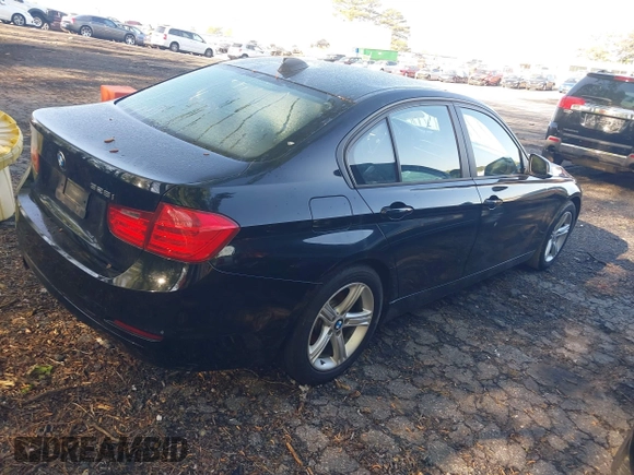 2015 BMW 3 Series 328i with VIN WBA3A5C59FF609332, listed as a IAAI auction lot 41994091 with 194,245 mi miles. Bid and sale history available at carsss.com. Image 4.