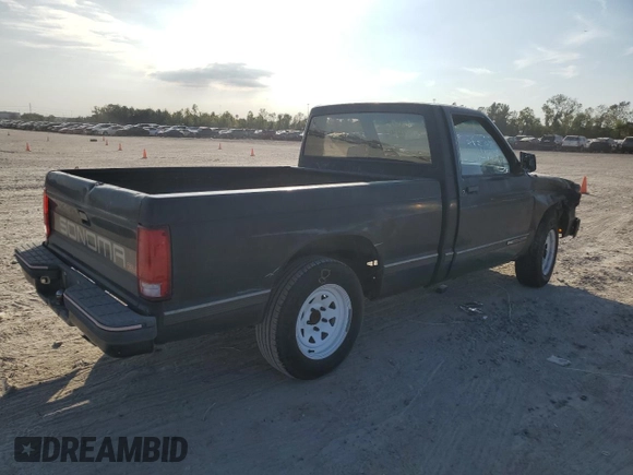 1991 GMC Sonoma with VIN 1GTCS14RXM2559524, listed as a Copart auction lot 79871374 with 228,691 mi miles and Salvage Title. Bid and sale history available at DreamBid. Image 3.