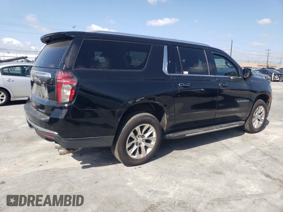 2023 Chevrolet Suburban Premier with VIN 1GNSKFKD8PR205665, listed as a Copart auction lot 51694655 with 27,882 mi miles and Salvage title. Bid and sale history available at DreamBid. Image 3.