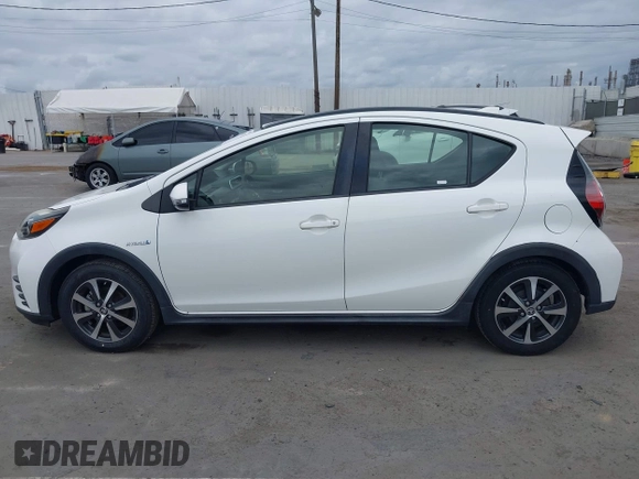 2018 Toyota Prius One with VIN JTDKDTB37J1615520, listed as a IAAI auction lot 42054113 with 76,989 mi miles and . Bid and sale history available at DreamBid. Image 14.