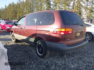 1999 Toyota Sienna CE with VIN 4T3ZF19C0XU151077, listed as a IAAI auction lot 41692028 with 1 mi miles. Bid and sale history available at carsss.com. Image 3.