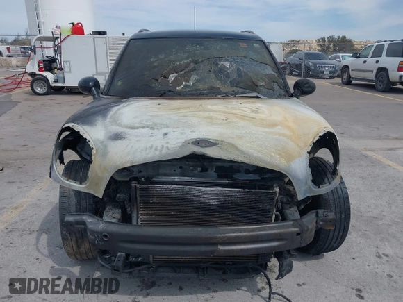 2014 MINI Countryman S with VIN WMWZC3C55EWP25697, listed as a IAAI auction lot 41797132 with Not Provided miles and . Bid and sale history available at DreamBid. Image 11.