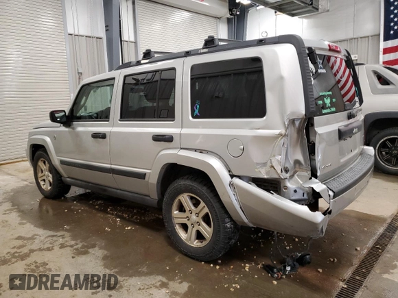 2006 Jeep Commander with VIN 1J8HG48N86C275203, listed as a Copart auction lot 57827085 with 197,552 mi miles and Clean title. Bid and sale history available at DreamBid. Image 2.