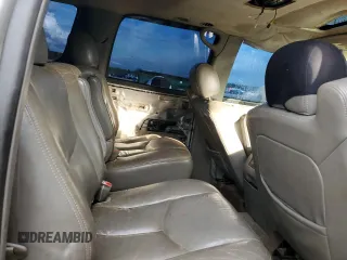 2004 Chevrolet Suburban LT with VIN 1GNEC16Z24J118695, listed as a Copart auction lot 52744505 with 306,940 mi miles and Salvage title. Bid and sale history available at DreamBid. Image 11.