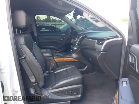 2020 Chevrolet Tahoe LTZ with VIN 1GNSCCKCXLR215899, listed as a IAAI auction lot 40128171 with 109,541 mi miles and . Bid and sale history available at DreamBid. Image 5.
