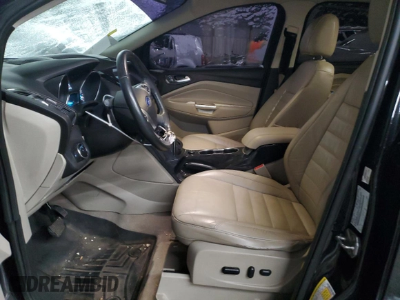 2015 Ford Escape Titanium with VIN 1FMCU0J91FUA41653, listed as a Copart auction lot 88871205 with 128,971 mi miles and Salvage Title. Bid and sale history available at DreamBid. Image 7.