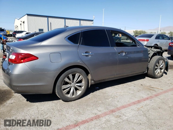 2012 Infiniti M with VIN JN1BY1AP8CM333534, listed as a Copart auction lot 68281463 with 124,182 mi miles and Salvage Title. Bid and sale history available at carsss.com. Image 3.