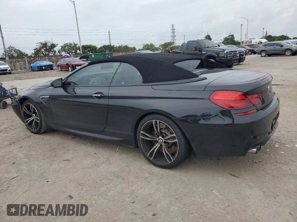 2015 BMW M6 with VIN WBSLZ9C52FD651302, listed as a Copart auction lot 79278924 with 34,033 mi miles and Salvage title. Bid and sale history available at DreamBid. Image 2.