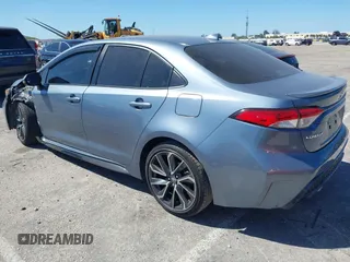 2021 Toyota Corolla SE with VIN JTDS4MCE1MJ063524, listed as a IAAI auction lot 41822622 with 50,882 mi miles. Bid and sale history available at carsss.com. Image 3.