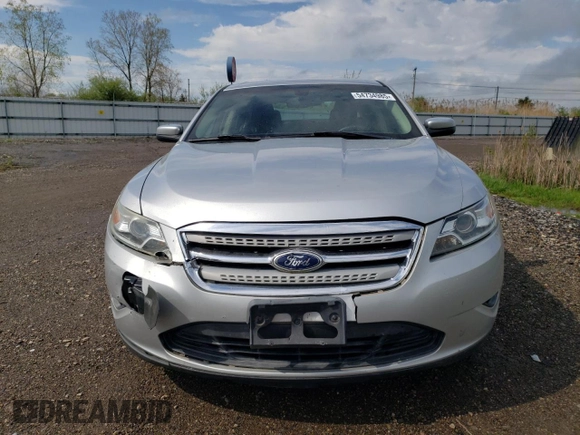 2011 Ford Taurus SEL z VIN 1FAHP2EW3BG119538, wystawiony jako Copart lot #54734985 z przebiegiem 53 753 mil mil oraz Szkoda całkowita • Salvage title. Historia ofert i sprzedaży dostępna na DreamBid. Obrazek 5.