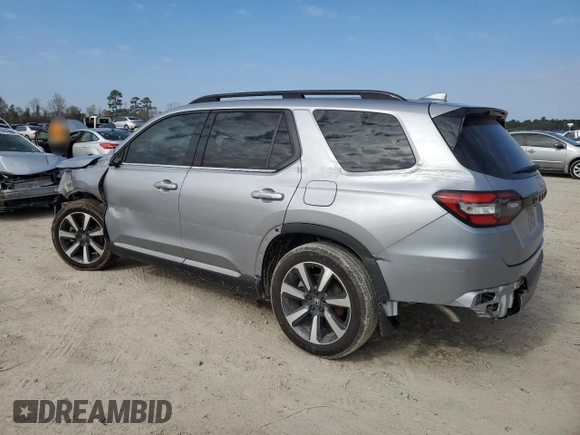2023 Honda Pilot Touring with VIN 5FNYG2H73PB000923, listed as a Copart auction lot 41459755 with 39,829 mi miles and Salvage title. Bid and sale history available at DreamBid. Image 2.