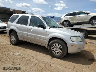 2007 Mercury Mariner Luxury with VIN 4M2YU91117KJ02032, listed as a Copart auction lot 50418815 with 128,498 mi miles and Salvage Title. Bid and sale history available at carsss.com. Image 4.