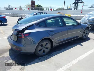2023 Tesla Model 3 z VIN 5YJ3E1EA6PF694419, wystawiony jako IAAI lot #42268637 z przebiegiem 17 419 mil mil oraz . Historia ofert i sprzedaży dostępna na DreamBid. Obrazek 4.