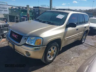 2004 GMC Envoy SLE z VIN 1GKDS13S442179334, wystawiony jako IAAI lot #41693042 z przebiegiem 224 868 mil mil oraz . Historia ofert i sprzedaży dostępna na DreamBid. Obrazek 2.