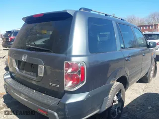 2006 Honda Pilot EX-L with VIN 2HKYF18596H500645, listed as a IAAI auction lot 41749033 with 242,599 mi miles. Bid and sale history available at carsss.com. Image 4.