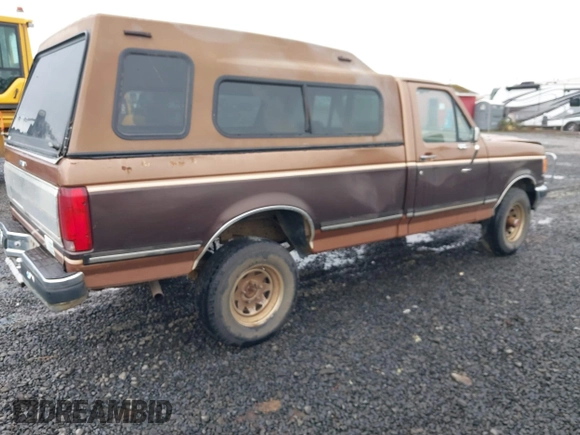 1990 Ford F-150 with VIN 2FTEF14Y1LCA00886, listed as a IAAI auction lot 41774272 with 17,872 mi miles. Bid and sale history available at carsss.com. Image 4.