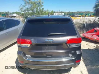 2014 Jeep Grand Cherokee Overland with VIN 1C4RJECG8EC409976, listed as a IAAI auction lot 41821685 with 186,105 mi miles. Bid and sale history available at carsss.com. Image 16.