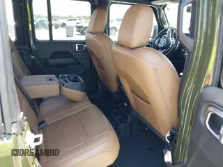 2022 Jeep Wrangler Unlimited Sahara z VIN 1C4HJXEN3NW242458, wystawiony jako IAAI lot #42352073 z przebiegiem 26 154 mil mil oraz . Historia ofert i sprzedaży dostępna na DreamBid. Obrazek 8.