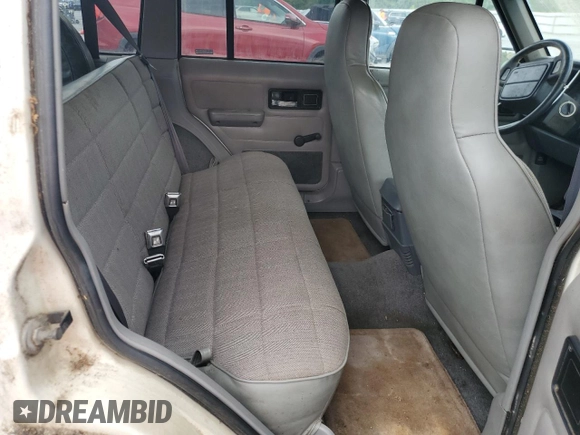 1996 Jeep Cherokee Sport z VIN 1J4FJ68S3TL103684, wystawiony jako Copart lot #63466265 z przebiegiem 163 715 mil mil oraz Czysty tytuł • Clean title. Historia ofert i sprzedaży dostępna na DreamBid. Obrazek 10.