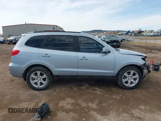 2007 Hyundai Santa Fe SE z VIN 5NMSH73E87H051418, wystawiony jako IAAI lot #41606640 z przebiegiem 185 407 mil mil oraz . Historia ofert i sprzedaży dostępna na DreamBid. Obrazek 14.