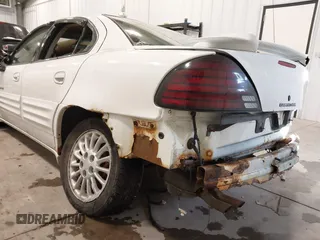 1999 Pontiac Grand Am SE2 with VIN 1G2NE52E4XM864232, listed as a IAAI auction lot 41321705 with 1 mi miles. Bid and sale history available at carsss.com. Image 13.