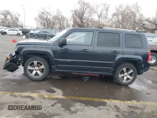 2016 Jeep Patriot Latitude with VIN 1C4NJRFB5GD545467, listed as a IAAI auction lot 41803699 with 172,398 mi miles. Bid and sale history available at carsss.com. Image 14.